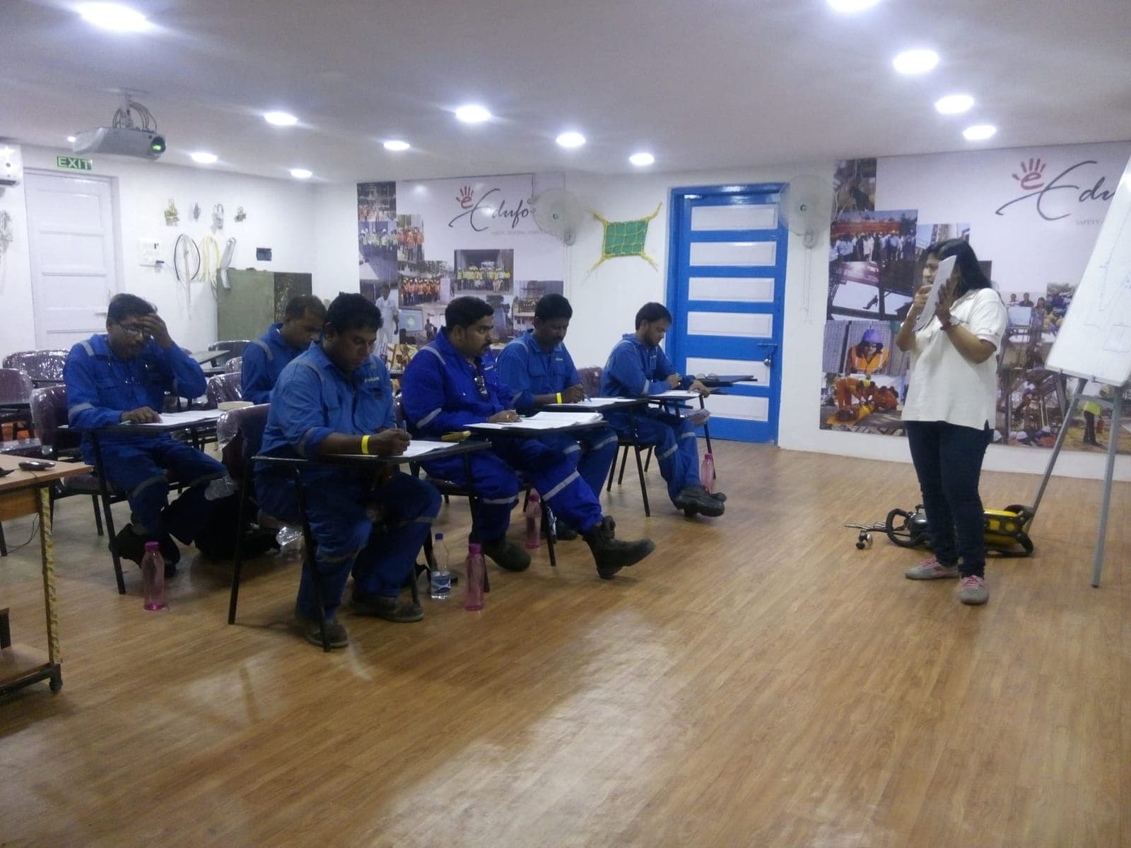Participants seated in an Eduforce classroom session while the trainer presents