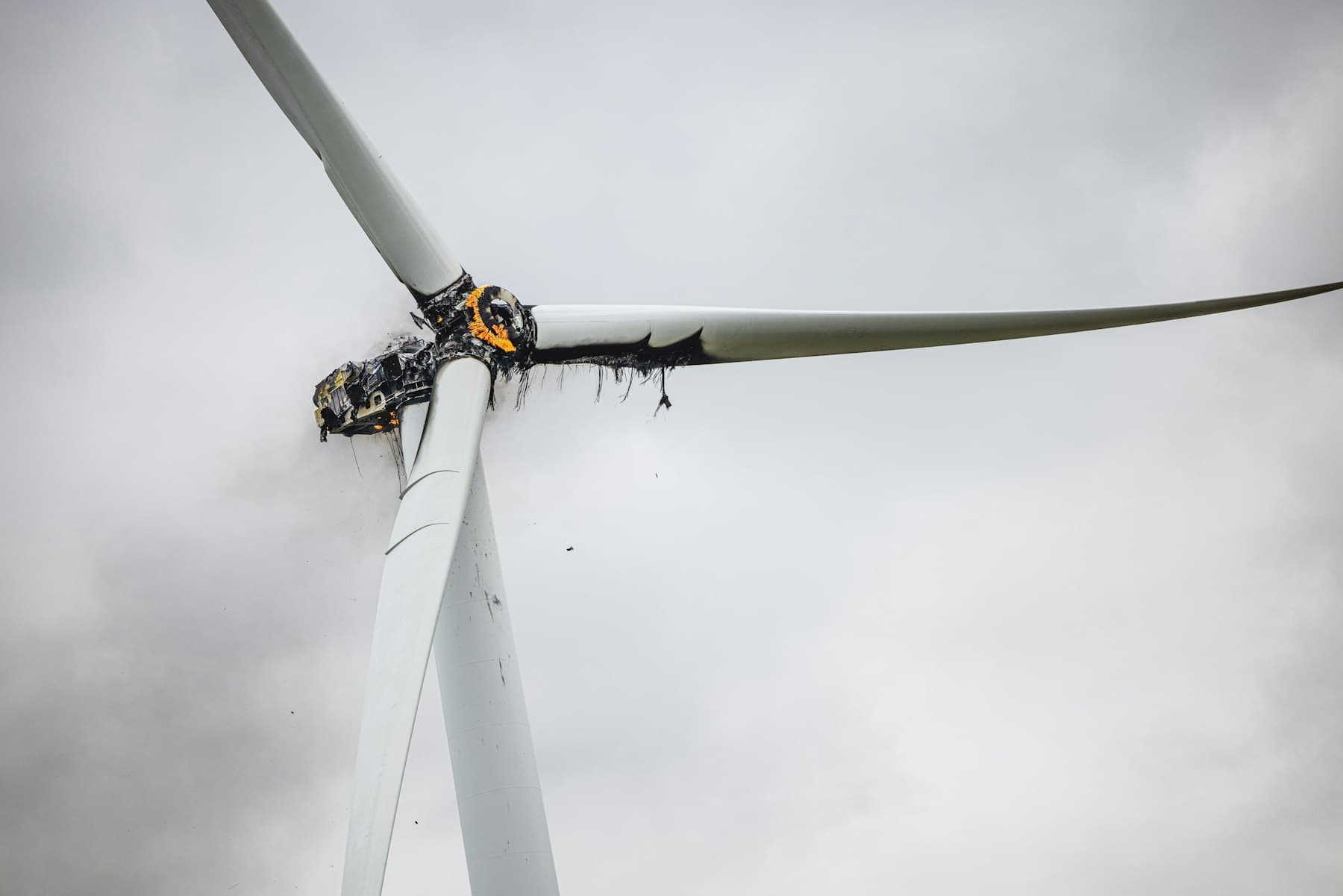 Wind turbine technicians working at height on a turbine in fall-protection equipment