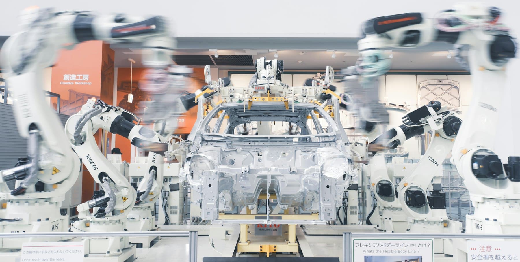 Automotive production line with material handling equipment