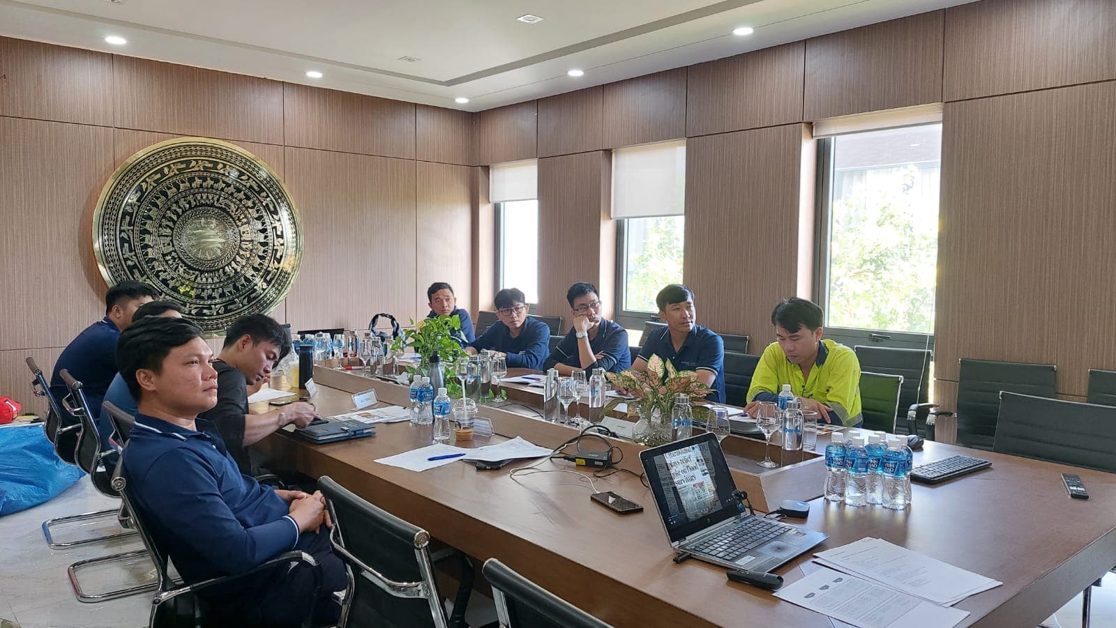 Participants seated along a long table during a GWO Basic Technical Training course briefing