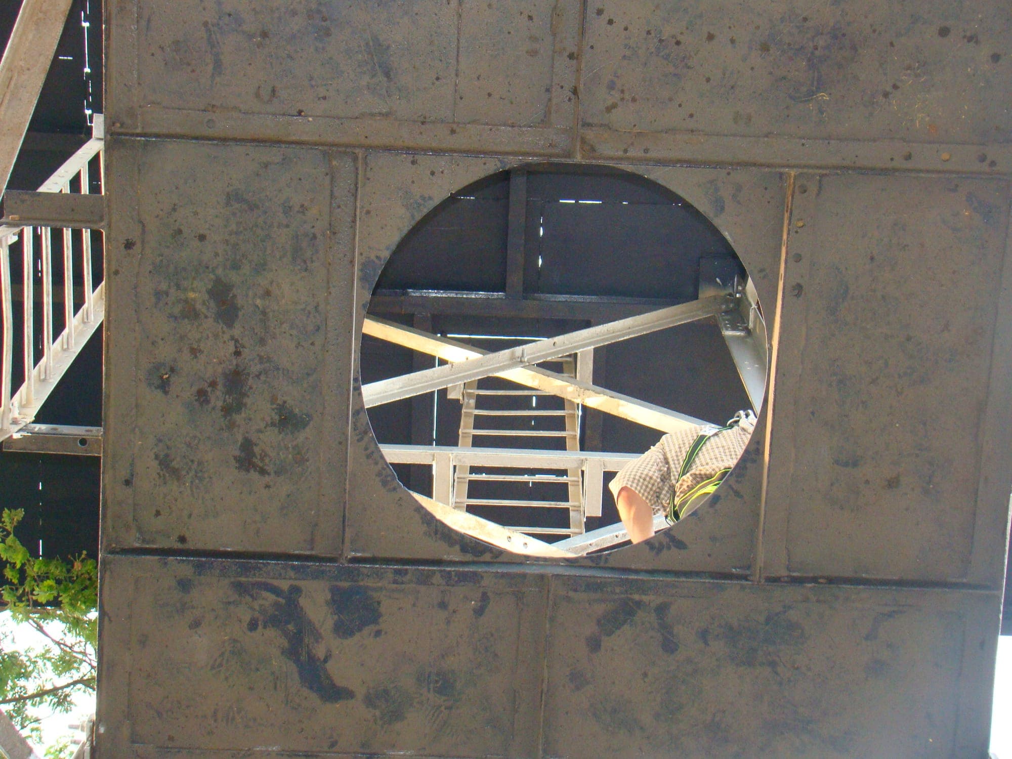 Circular confined space entry point built into a wall of the training centre simulator