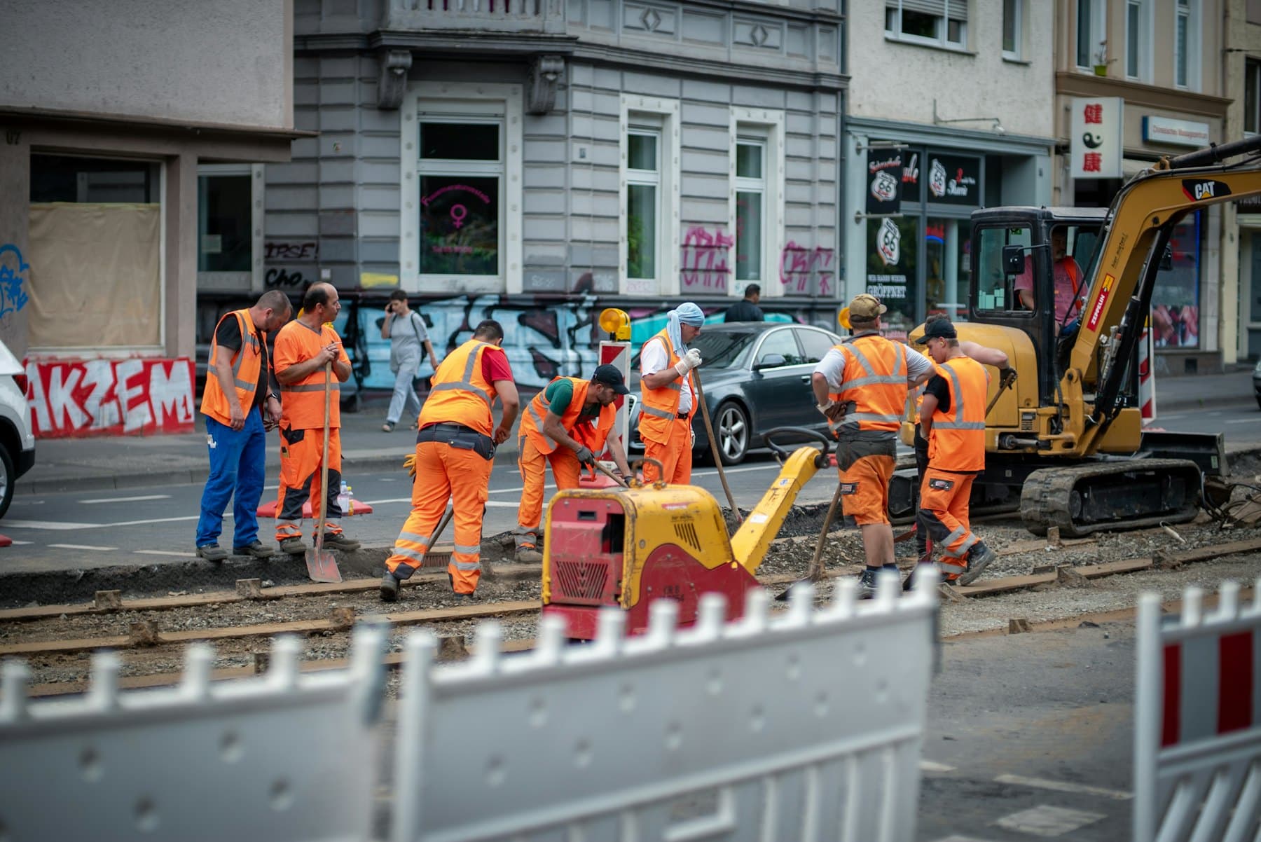 Safety manager supervising work on an active site